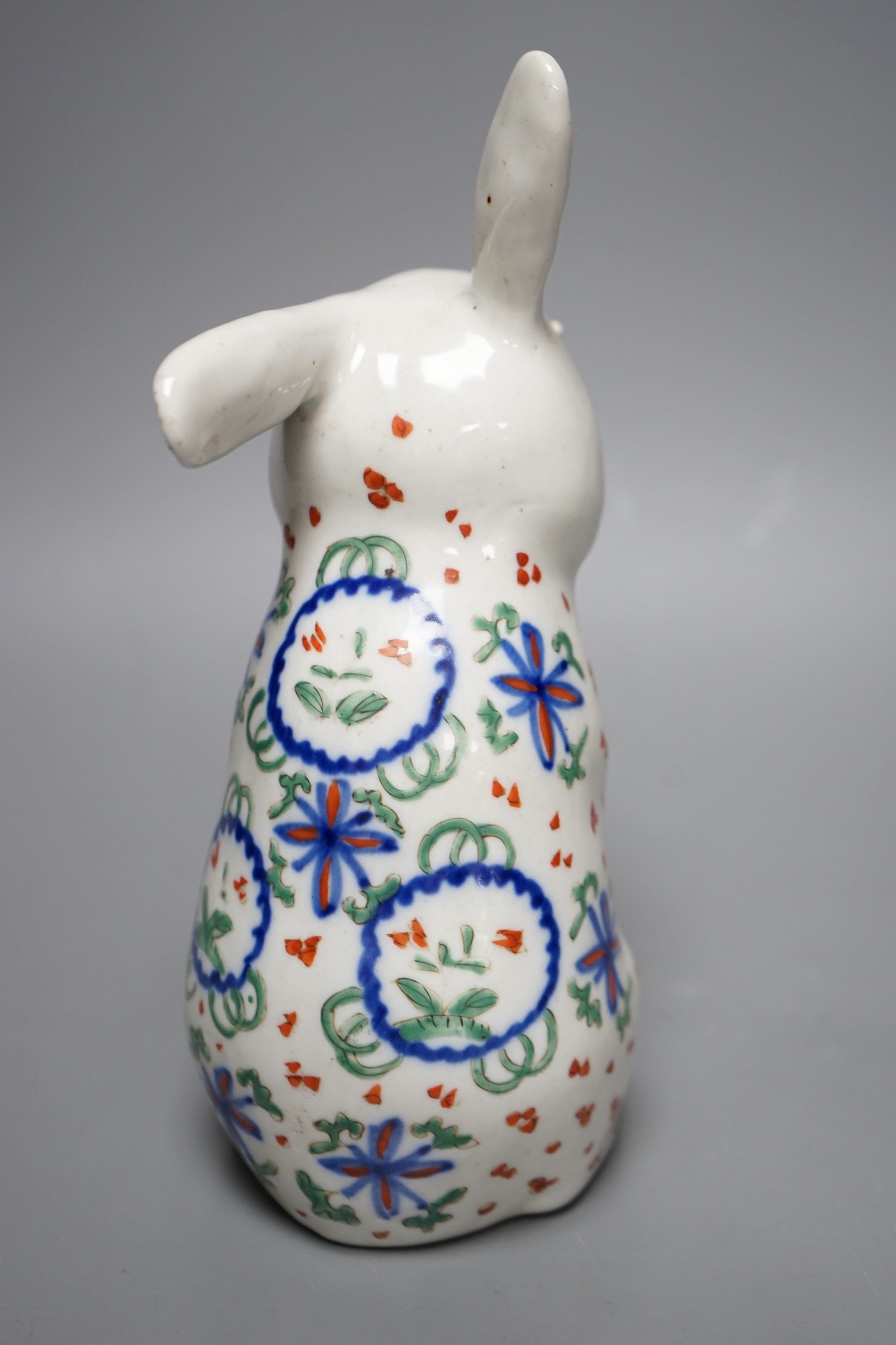 A Japanese Arita model of a seated rabbit, Meiji period, 23cm